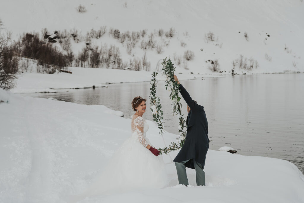 Winter wedding ceremony overlooking Lyngen Alps, Norway